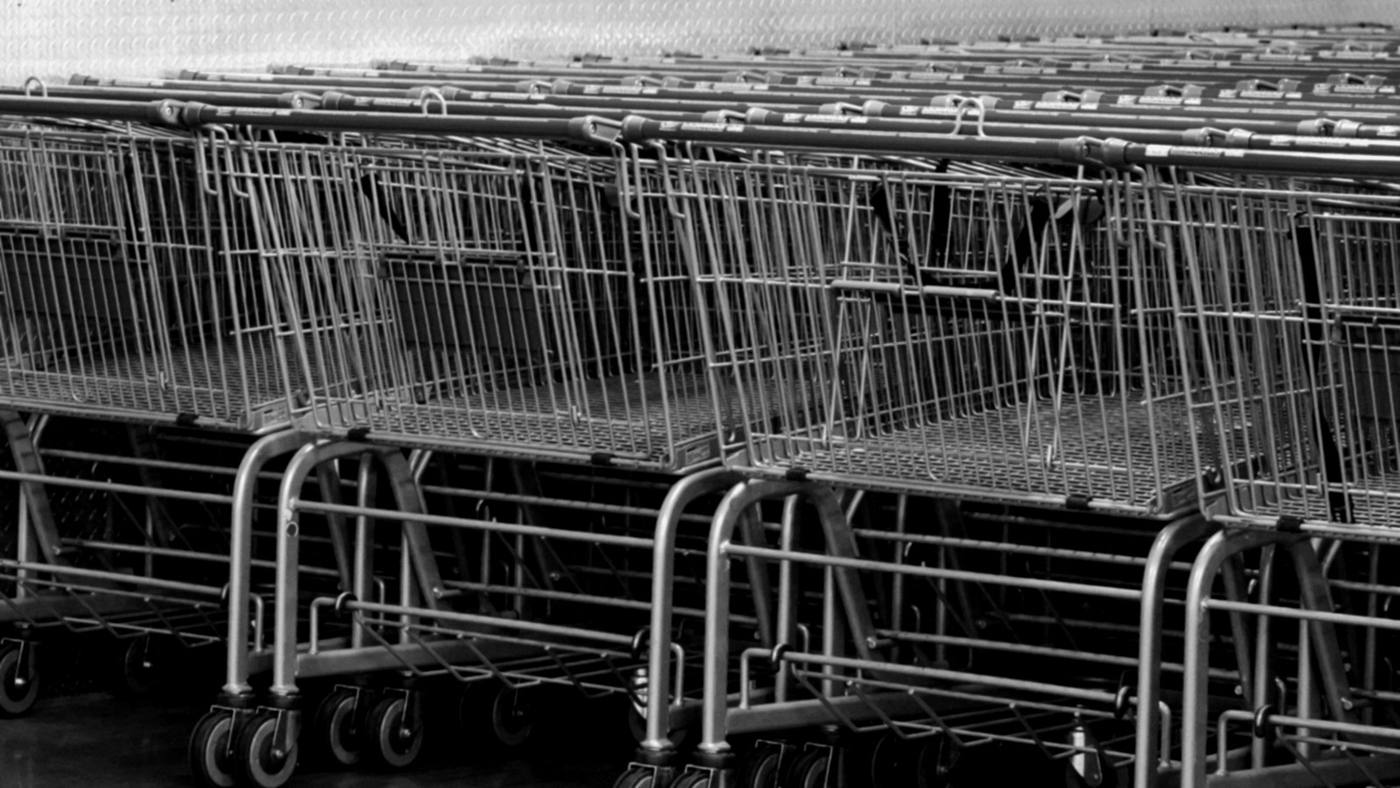 Rows of empty shopping trolleys
